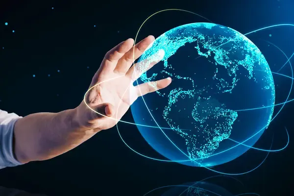 mano sosteniendo un holograma de un mundo digital