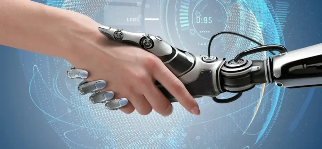 Chico dándole la mano a un robot